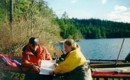 Fire Captain, Leonard Lowe, of Fall River, and biologist, Monica Gaertner at Kinsac Lake, Waverley